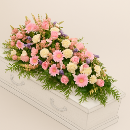 Fleurs deuil, deces et enterrement Nancy par fleuriste Interflora souvenir dessus de cercueil