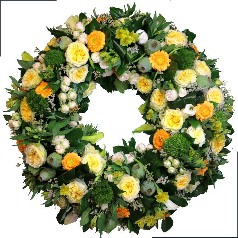 Fleurs deuil, deces et enterrement Nancy par fleuriste Interflora : Clarté, couronne de fleurs rayonnante.